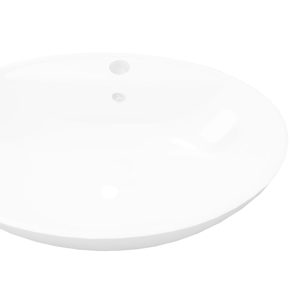 Lavabo cerámico ovalado con rebosadero