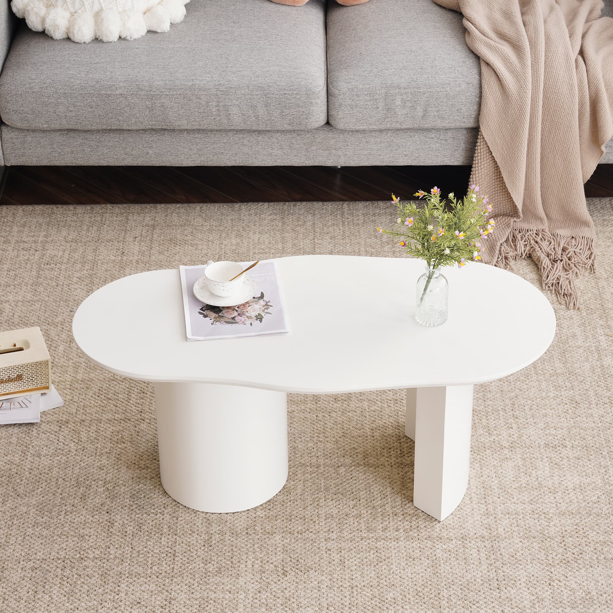 Weißer Couchtisch 100 cm geschwungene Platte