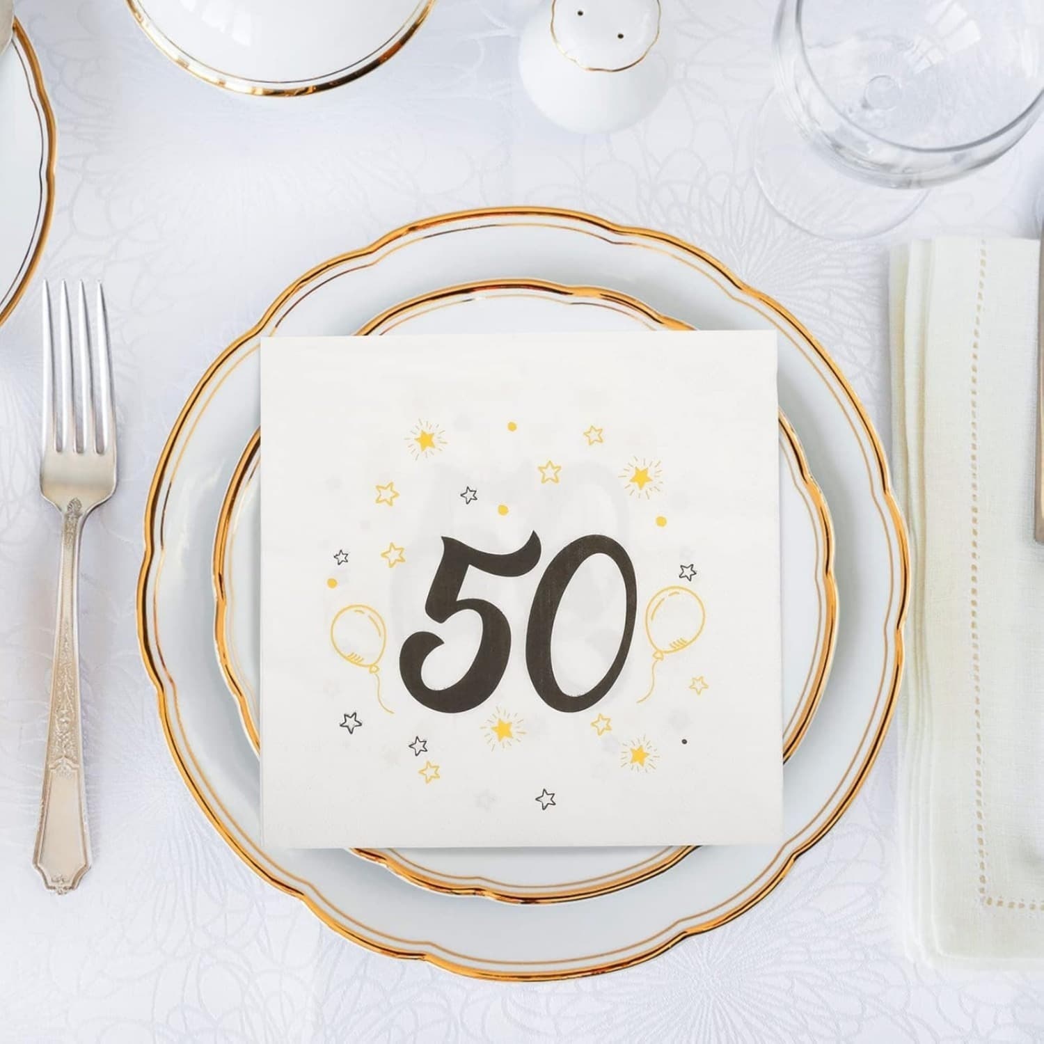 40 schwarz-goldene Servietten für festliche Tischdeko
