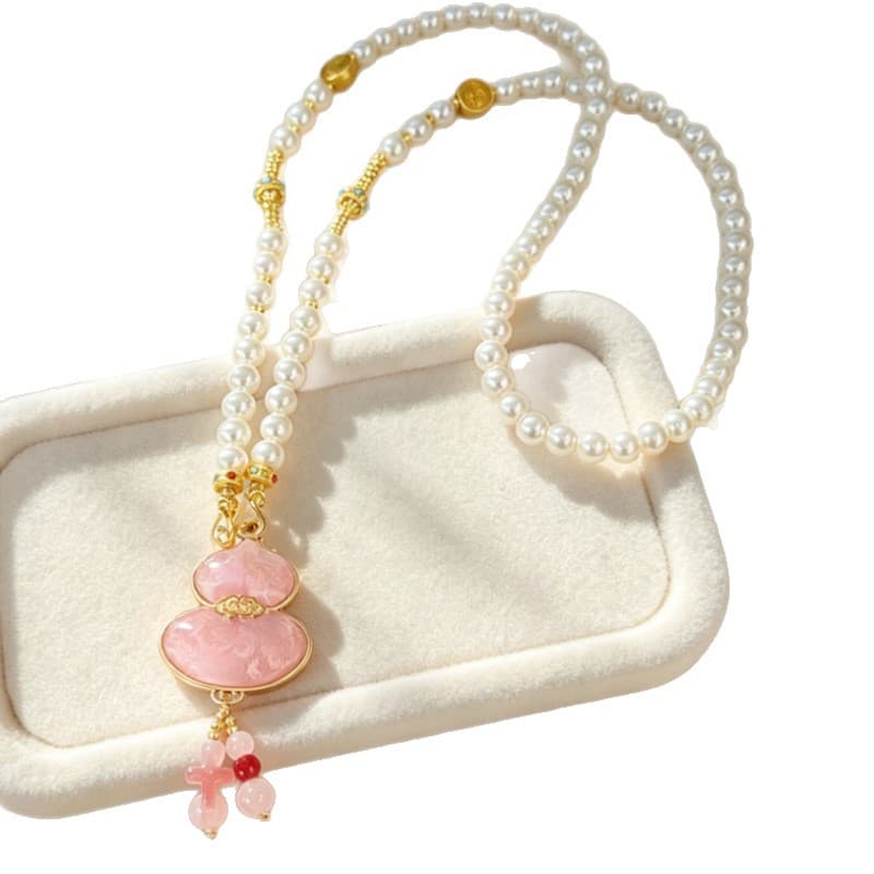 Lange Kürbis-Anhänger-Kette mit Perle im Seidenbrokat-Stil