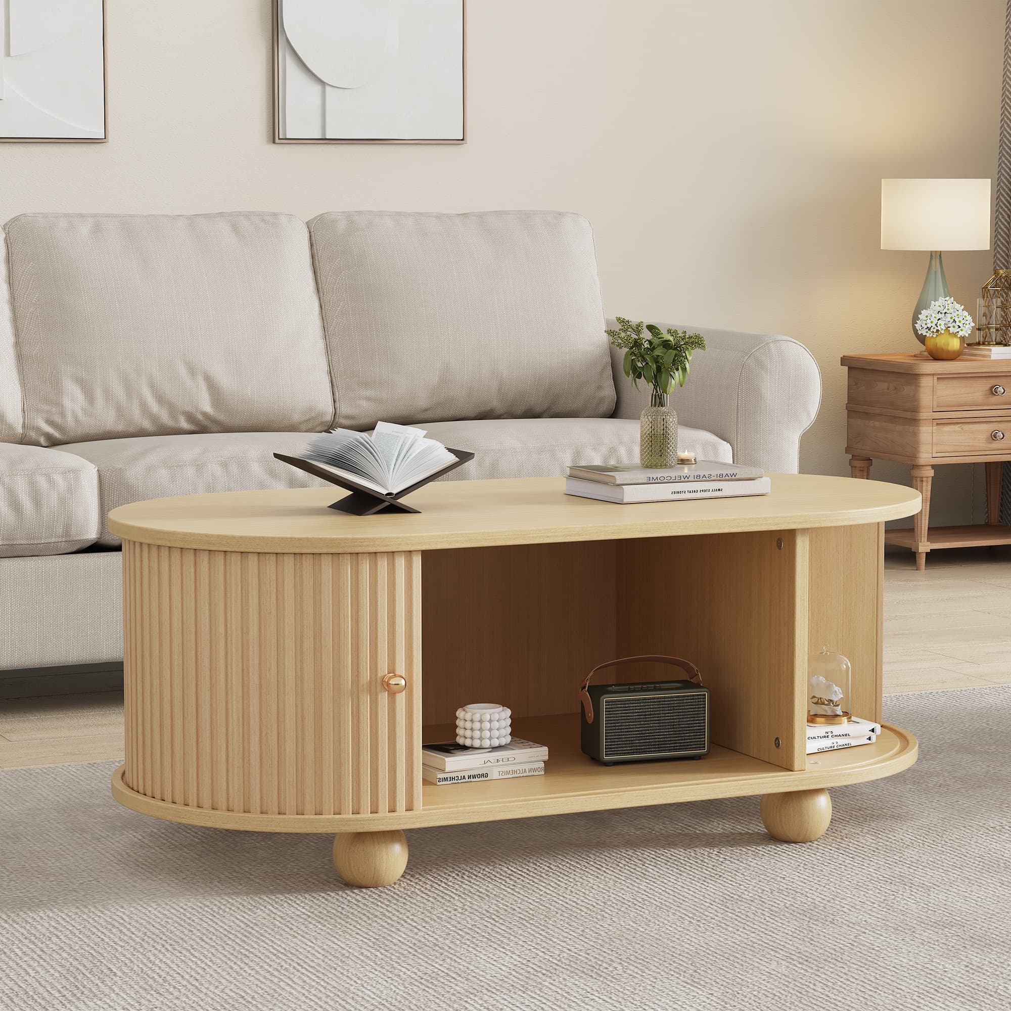 Ovale Couchtisch mit Stauraum und Schiebetüren
