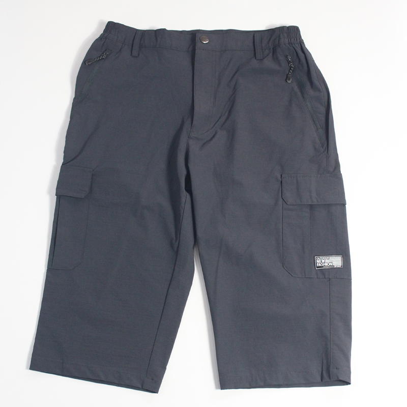 Pantalon de travail en tissu stretch pour homme à plusieurs poches, séchant rapidement, coupe droite.